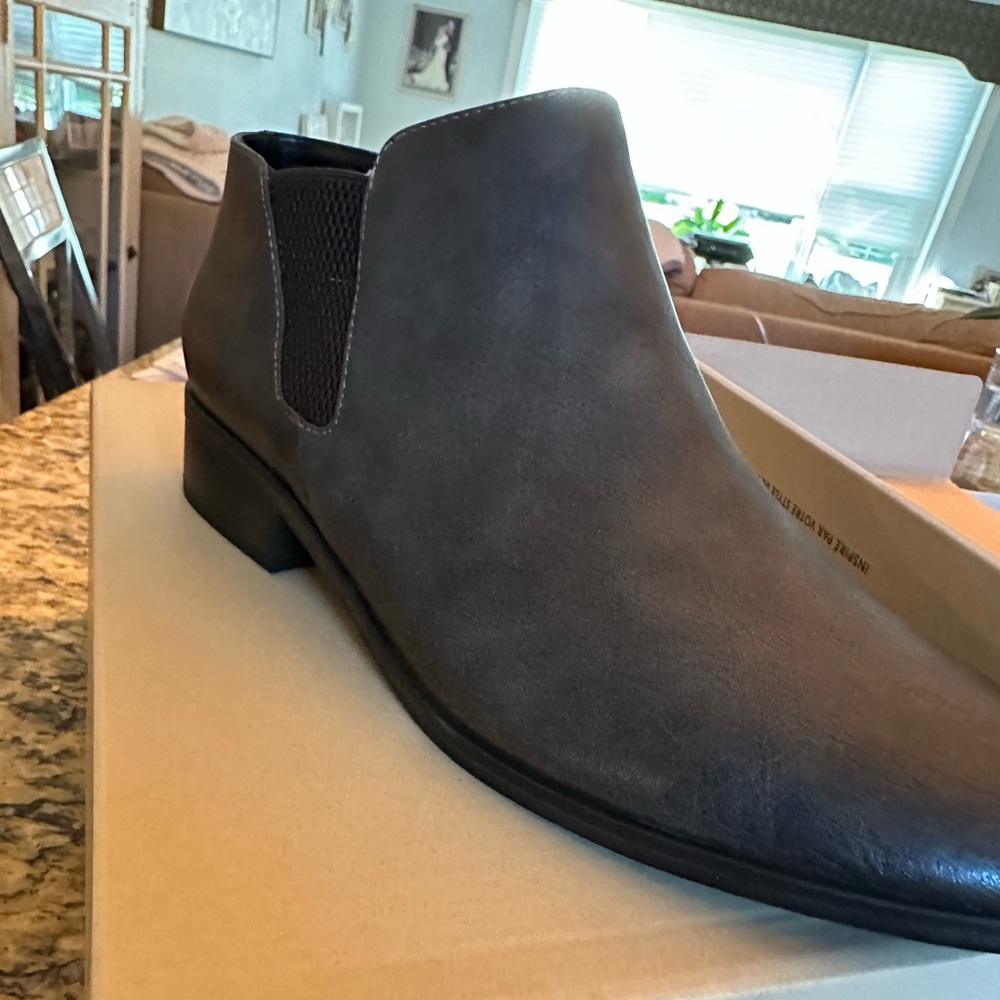Brand new. Price is for both. One gray/black and one brown.1” heel.